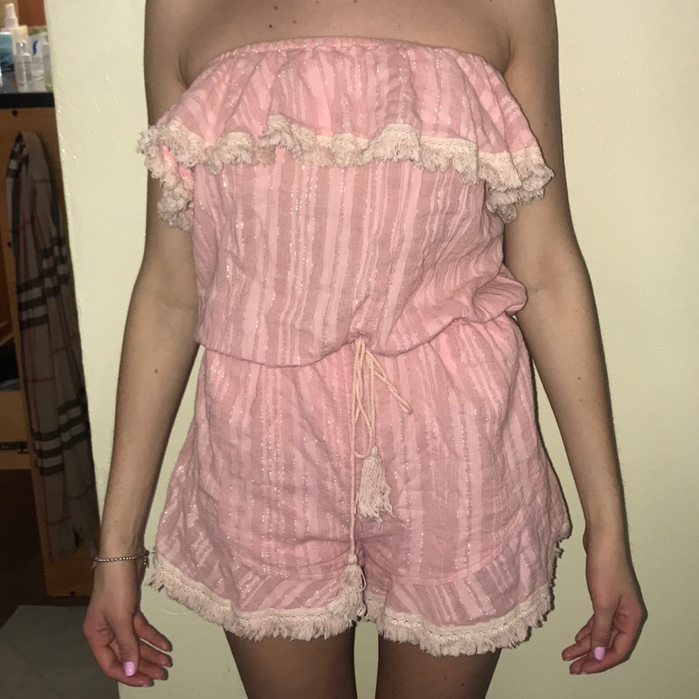 Pink romper bought in Greece. It’s sparkly!!